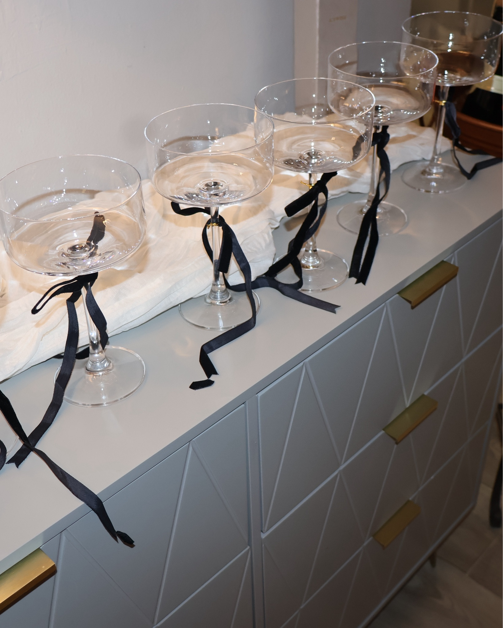 What’s a Prosecco party without a little bubbly?? Since we’d be clink clinking all night, I wanted to put some emphasis on our champagne glasses to make sure they fit the vibe! 

Champagne glasses | coquette | black ribbon | velvet bows | black bows | aesthetic vibes | Galentine’s | coupe glasses 

#LTKStyleTip #LTKMostLoved #LTKHome