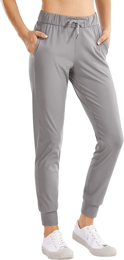 CRZ YOGA Women's Stretch Drawstring Pants Fitted Cuffed Sweatpants Casual Travel Jogger - 28 inch... | Amazon (US)
