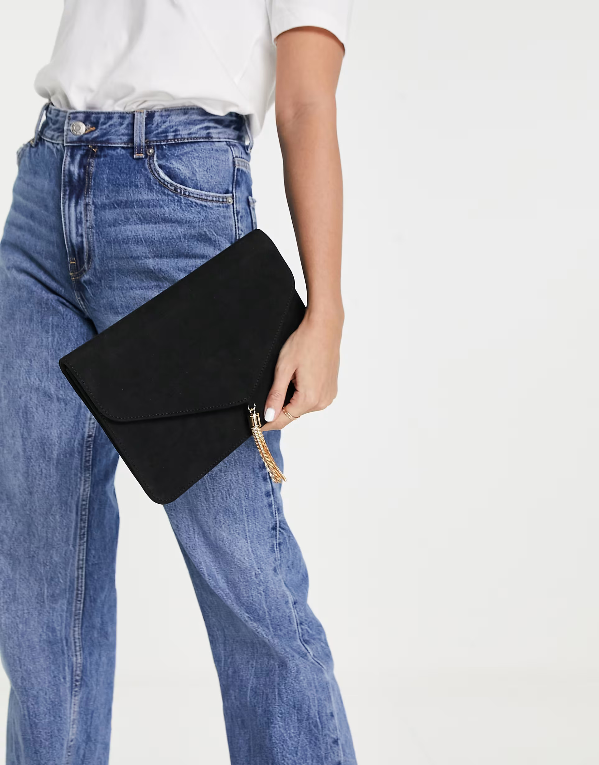 ASOS DESIGN tassel clutch bag in black | ASOS (Global)