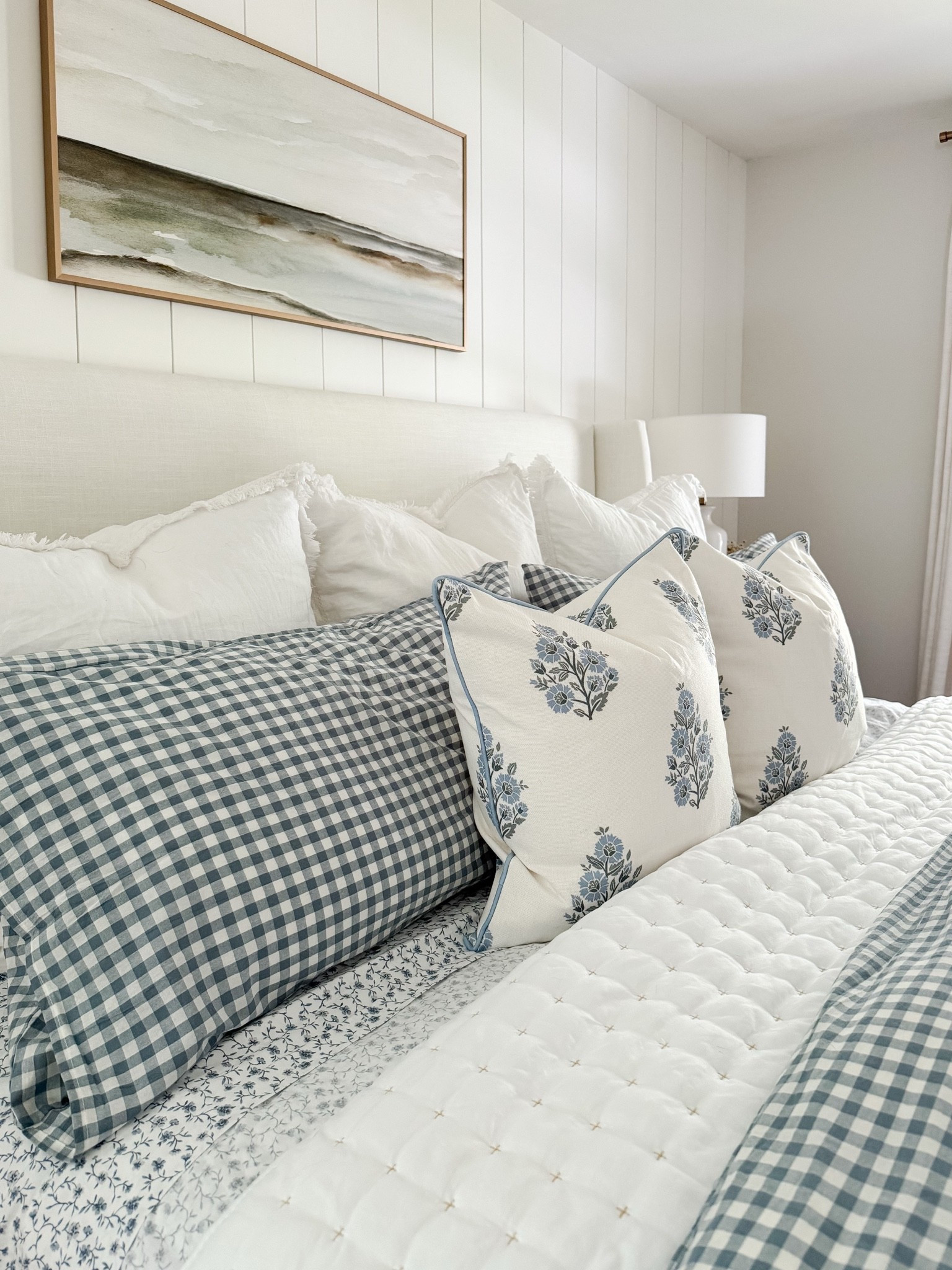 Layered coastal bedroom! This bedroom is all about relaxed layers, soft blues, and classic coastal patterns that make the space feel serene.

#LTKHome