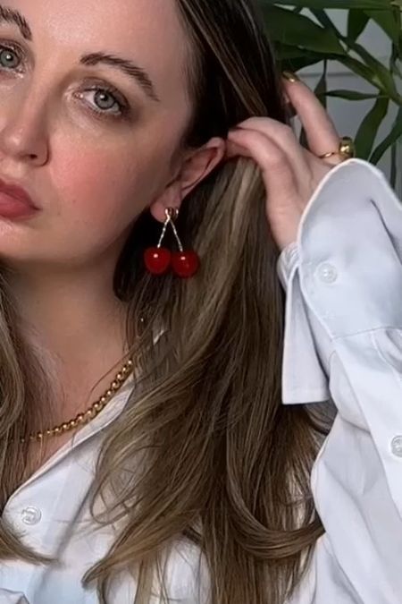 The cherry earrings I’ve been raving about… perfect for summer 🍒🍒
Fruit jewellery | Strawberry earrings | Red trend | Summer accessories | Poolside outfits | Red and gold 

#LTKsummer #LTKuk #LTKluxury