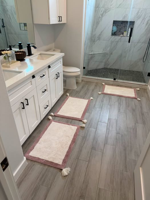The prettiest My Texas House pink border bath rugs! 🎀🩷 I LOVE these—and they’re machine washable too! 🙌 Such an easy + pretty bathroom refresh!

#LTKHome #LTKFinds #MyTexasHouse #BathroomDecor #HomeFinds 

 