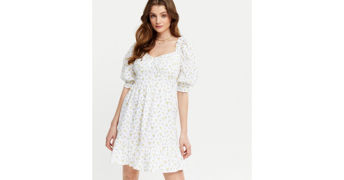 White Ditsy Floral Puff Sleeve Mini Dress
						
						Add to Saved Items
						Remove from Saved... | New Look (UK)