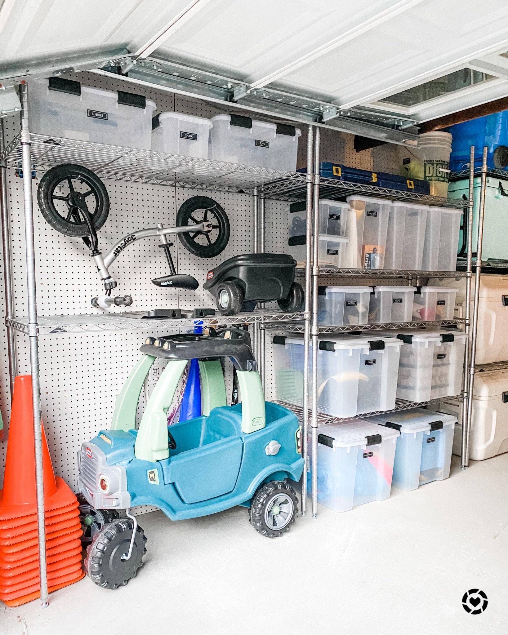 Shelves are great for using on the perimeter of your garage space. We always recommend using these weather tight totes to keep out pests and elements.

#LTKHoliday #LTKfamily #LTKkids