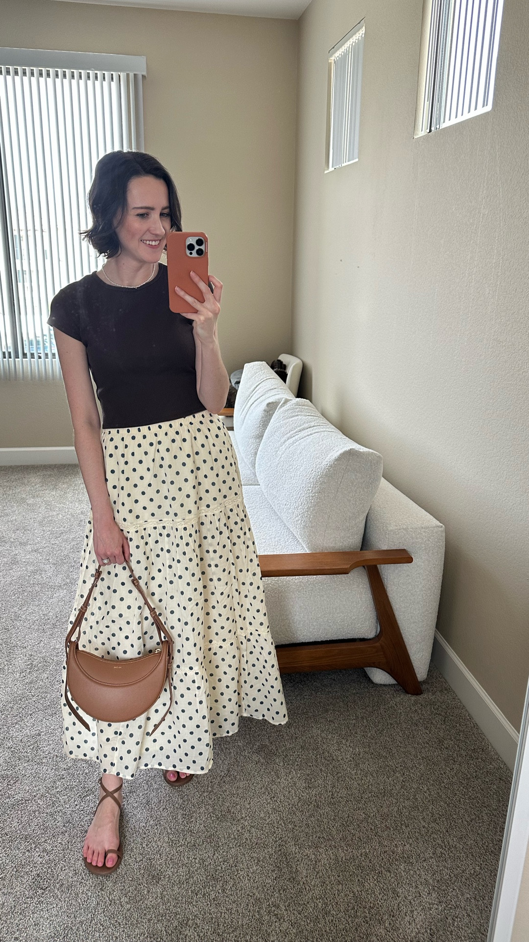 Wasn’t expecting this brown top to work with my polka dot maxi skirt but I’m kinda into it?! 🤎 lmk what you think 

Wearing a small in the top, XS in the skirt, and sandals run TTS 

#LTKdayinmylife #LTKgrwm #LTKootd