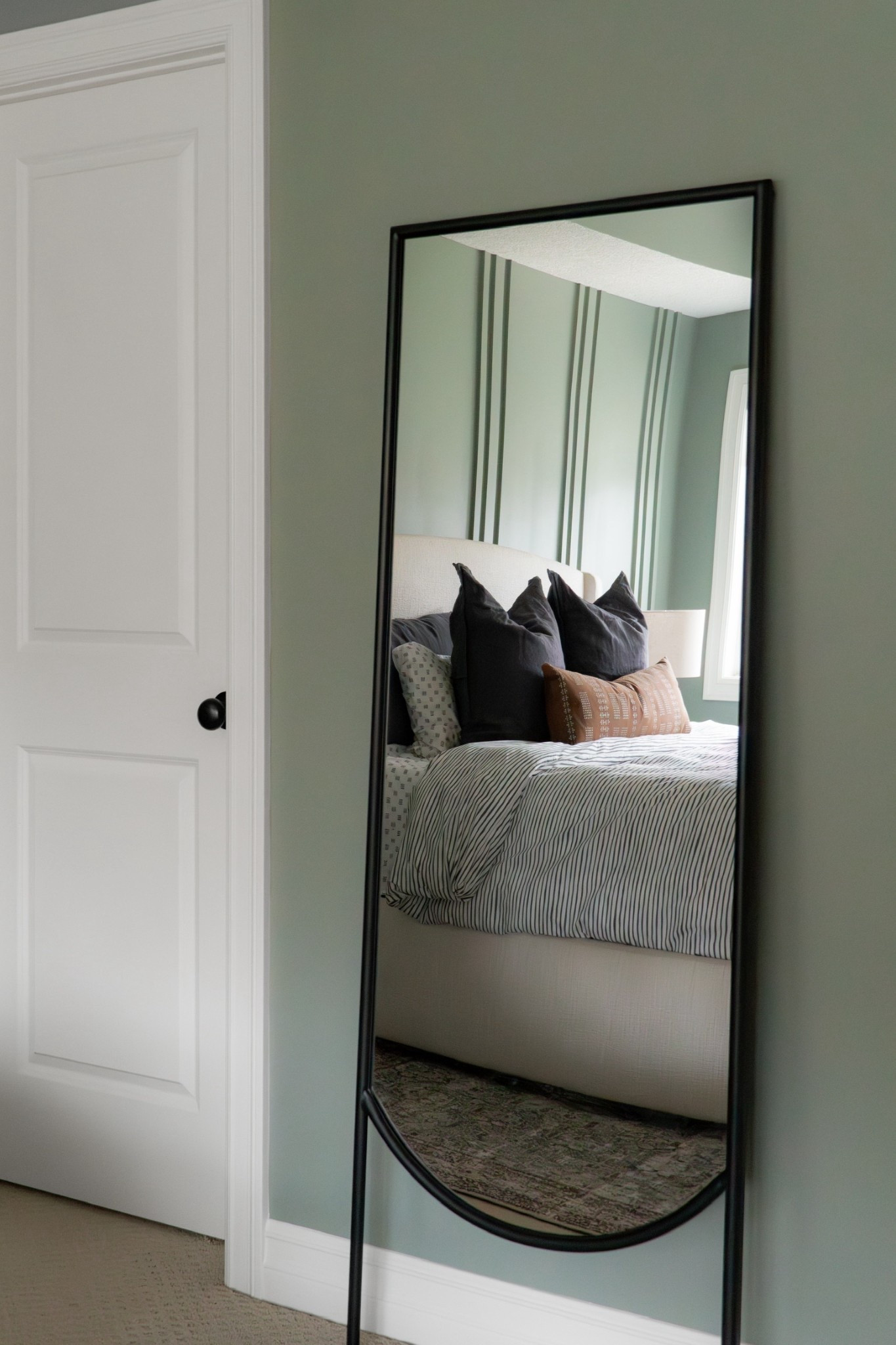 Sale alert! This floor mirror from our North Oaks bedroom project is on sale! We love the minimalist metal frame and the arched detail on the bottom. And it can lean against a wall or be mounted.

#LTKStyleTip #LTKHome #LTKSaleAlert