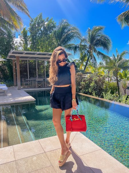 Wearing a small in swimsuit, top, and shorts! Shoes are TTS. 

beach outfit, pool outfit, black bikini, swimsuit cover up, Tularosa, Prada sandals, raffia sandals, Hermes bag, Emily Ann Gemma, resort wear, vacation outfit

Anguilla, Anguilla four seasons

All outfit details & travel details on my Anguilla highlight tab on Instagram. 🇦🇮 

#LTKtravel #LTKswim #LTKSeasonal
