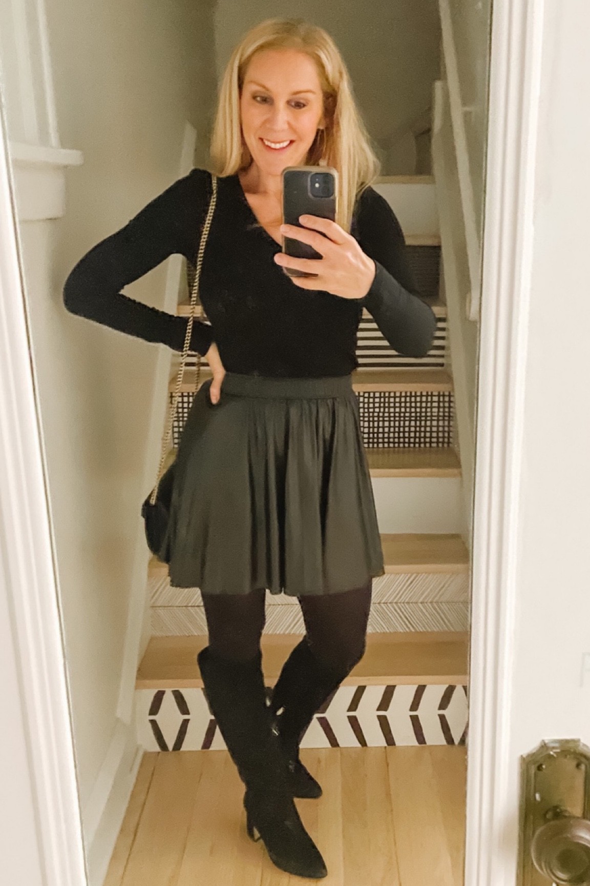 I love an all black outfit and this faux leather skirt helps to elevate the outfit for work, a date night or girls night!

#LTKworkwear #LTKHoliday #LTKstyletip