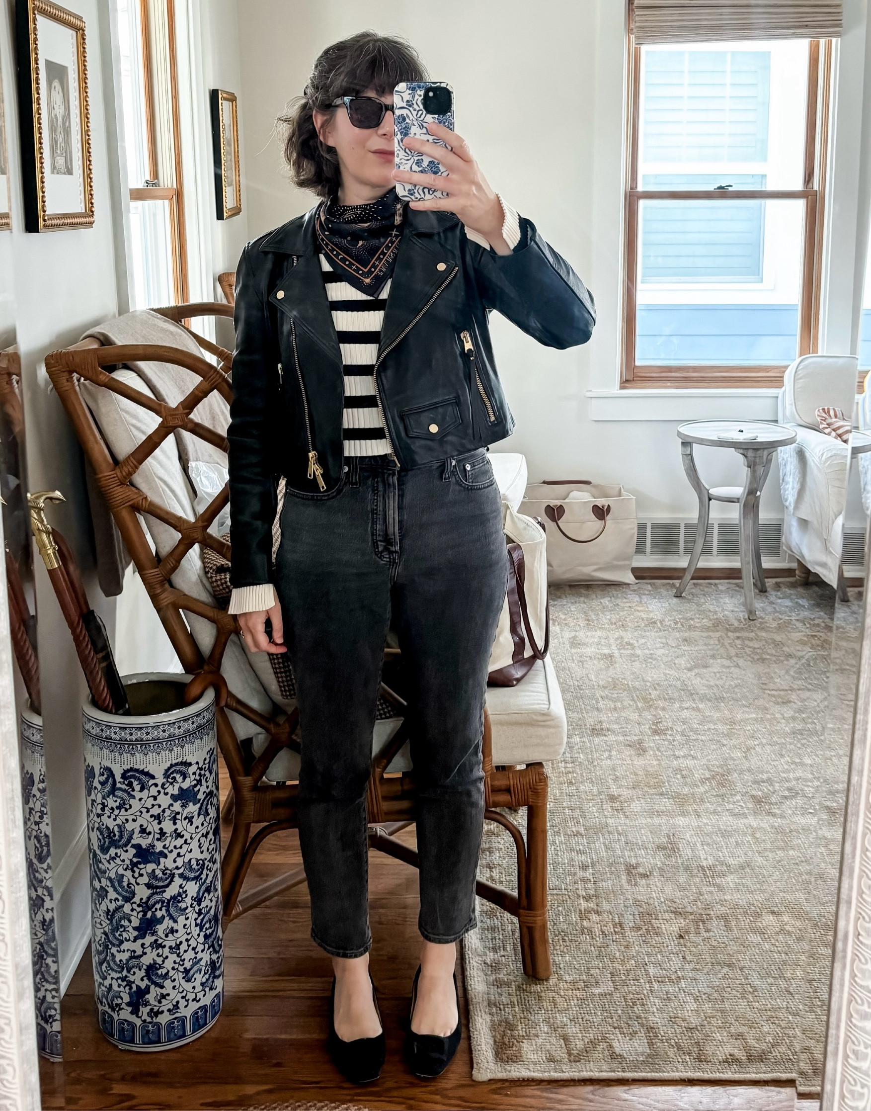 What I wore for the solar eclipse: cropped motorcycle jacket, Fleur Sauvage silk bandana, and Ann Mashburn buckle flats.

#LTKover40 #LTKstyletip #LTKSeasonal