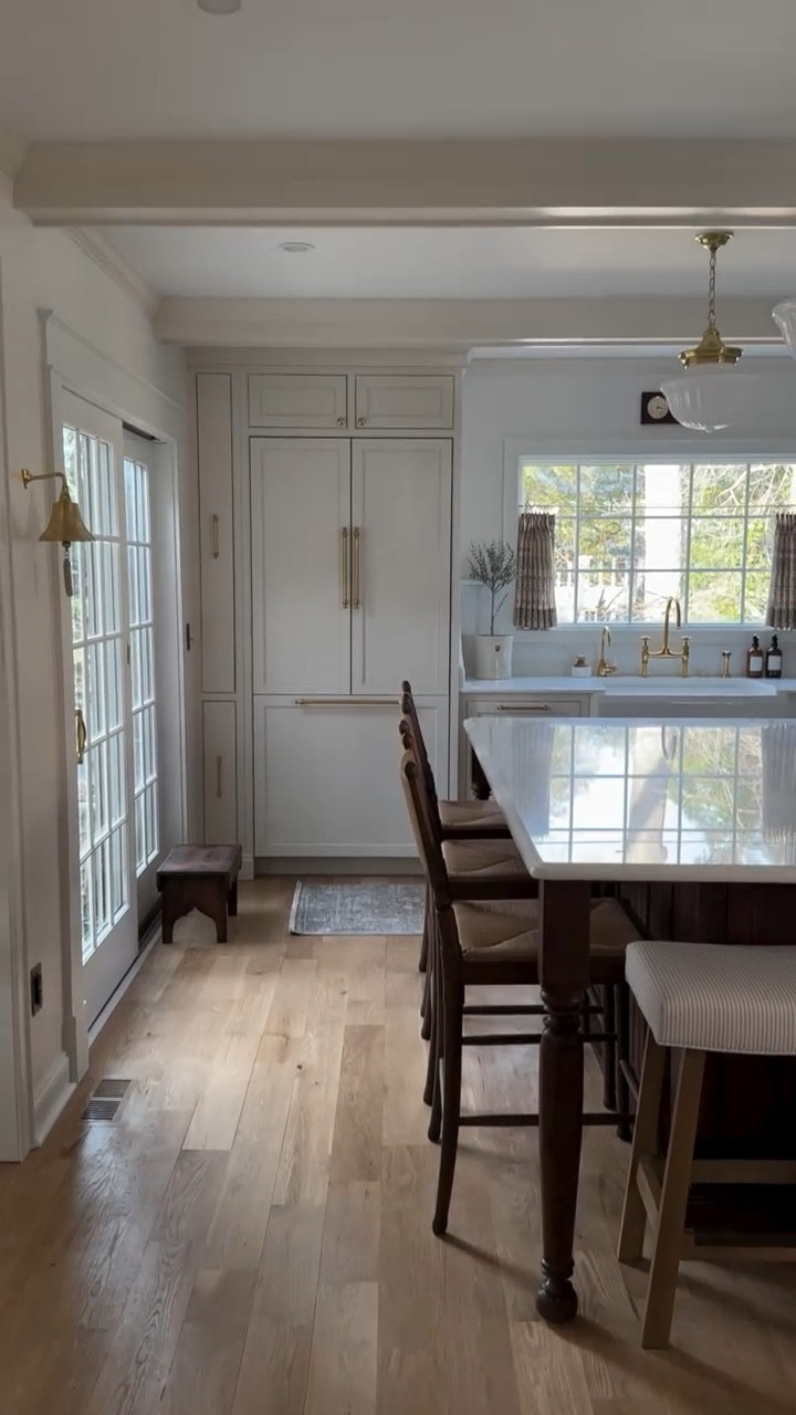 When the layout is just right but the space is reaching its end of life 🫡 The space feels so much bigger and although brighter, warmer and welcoming. Can’t wait to continue to style and find all of the right pieces to make it home! If you missed the reveal, you can head to the bio for a full detailed post. I’ll be revealing the finished nook and bar very soon!

Comment NEW below to receive a DM with the link to shop this post on my LTK ⬇ https://liketk.it/57Isb 

Thank you to my design and build teams for bringing this vision to life @intuitive.design_ & @greateasterncontracting 
•
•
•
#classichomedecor #homerenovation #homedesign #homebeforeandafter #kitchenrenovation #kitchendesign #homerenovations #traditionalhome #cottagekitchen #demoday #homedemo #kitchendemo #kitchenbeforeandafter #cottagekitchen #nancymeyers #coastalkitchen