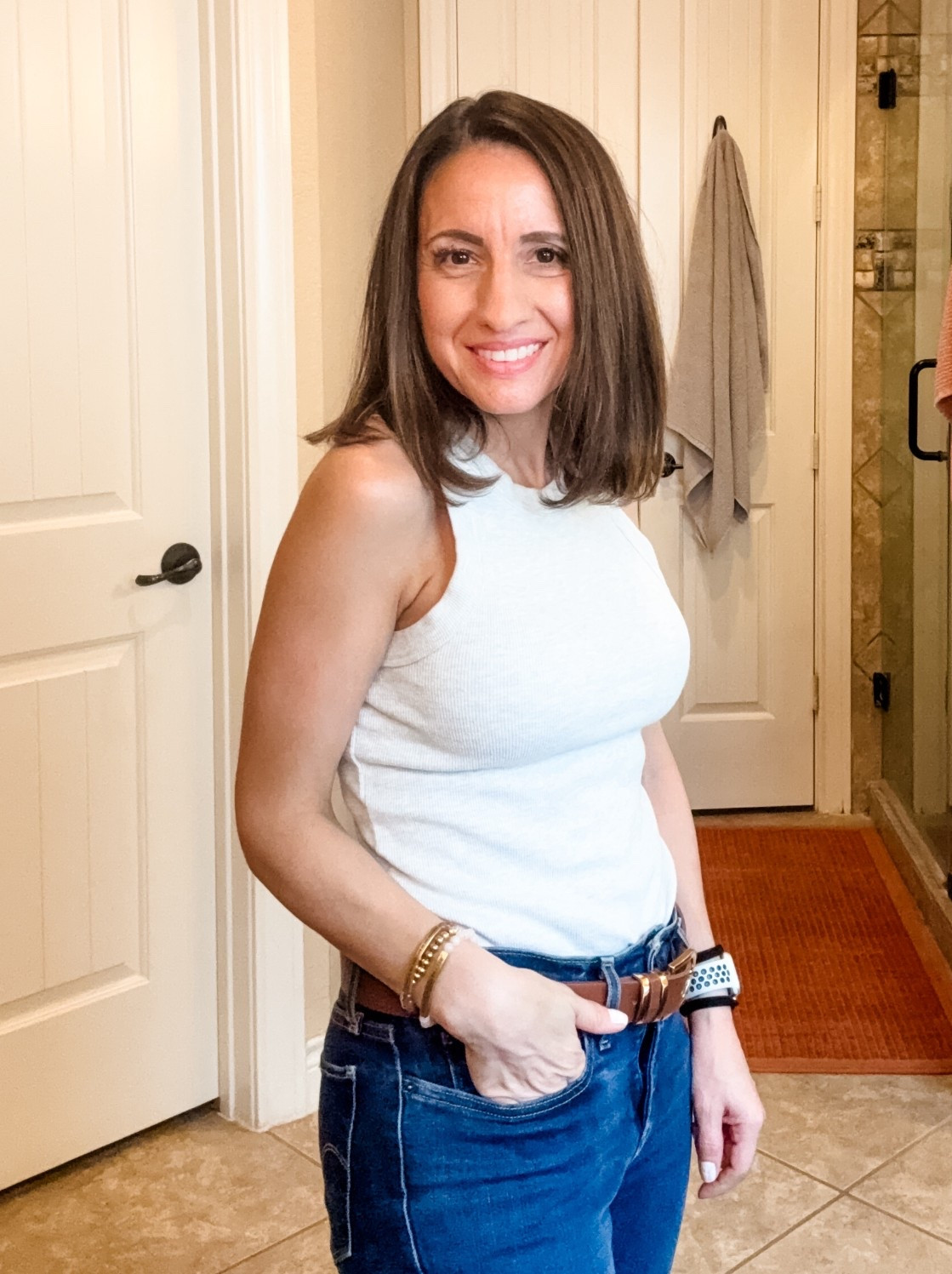 Casual outfit when you want to feel put together, but have a to do list a mile long. 
Old Navy Tank top. Runs true to size. 
Levi’s shaping 311 jeans. They run true to size. If you’re 5’0 you will need them altered. 
Love this brown belt with gold detail. This is a Walmart find. Screams expensive but it isn’t. Wearing an xsmall belt. 
Petite style 
Petite outfit 

#LTKmomlife #LTKootd #LTKPetite