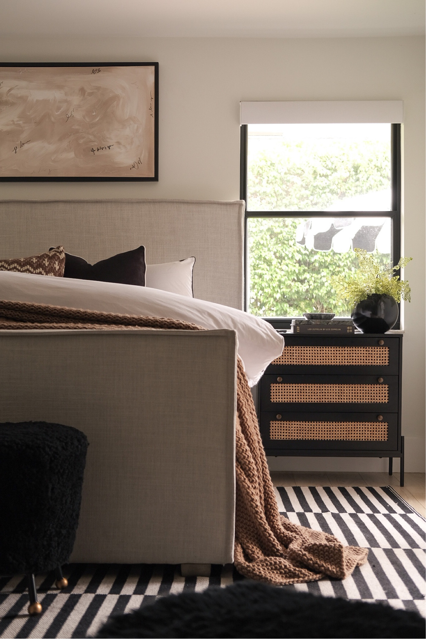Bedroom decor 
Upholstered bed 
Black nightstand 
#meandmrjones 

#LTKhome #LTKunder100 #LTKunder50