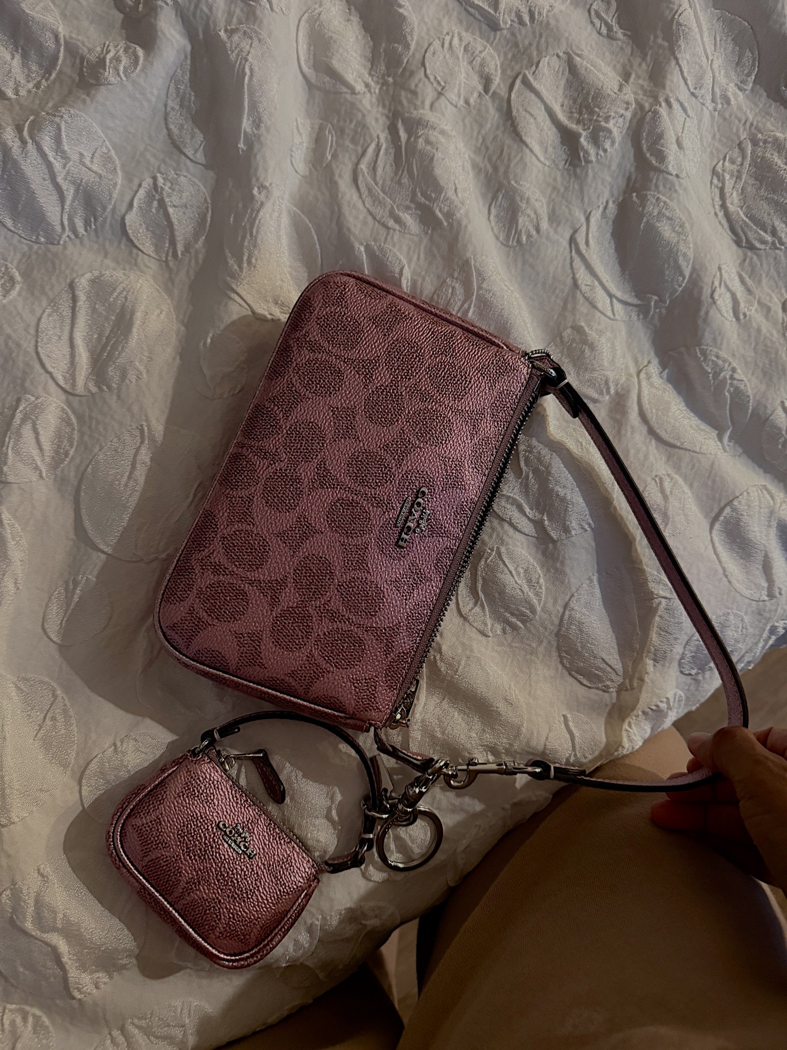 The cutest little baby girl 🩷⚡️she fits my iPhone 16 pro, my card holder, lip gloss , lip liner and still more room plus the mini can hold things as well 

#LTKHoliday #LTKGiftGuide