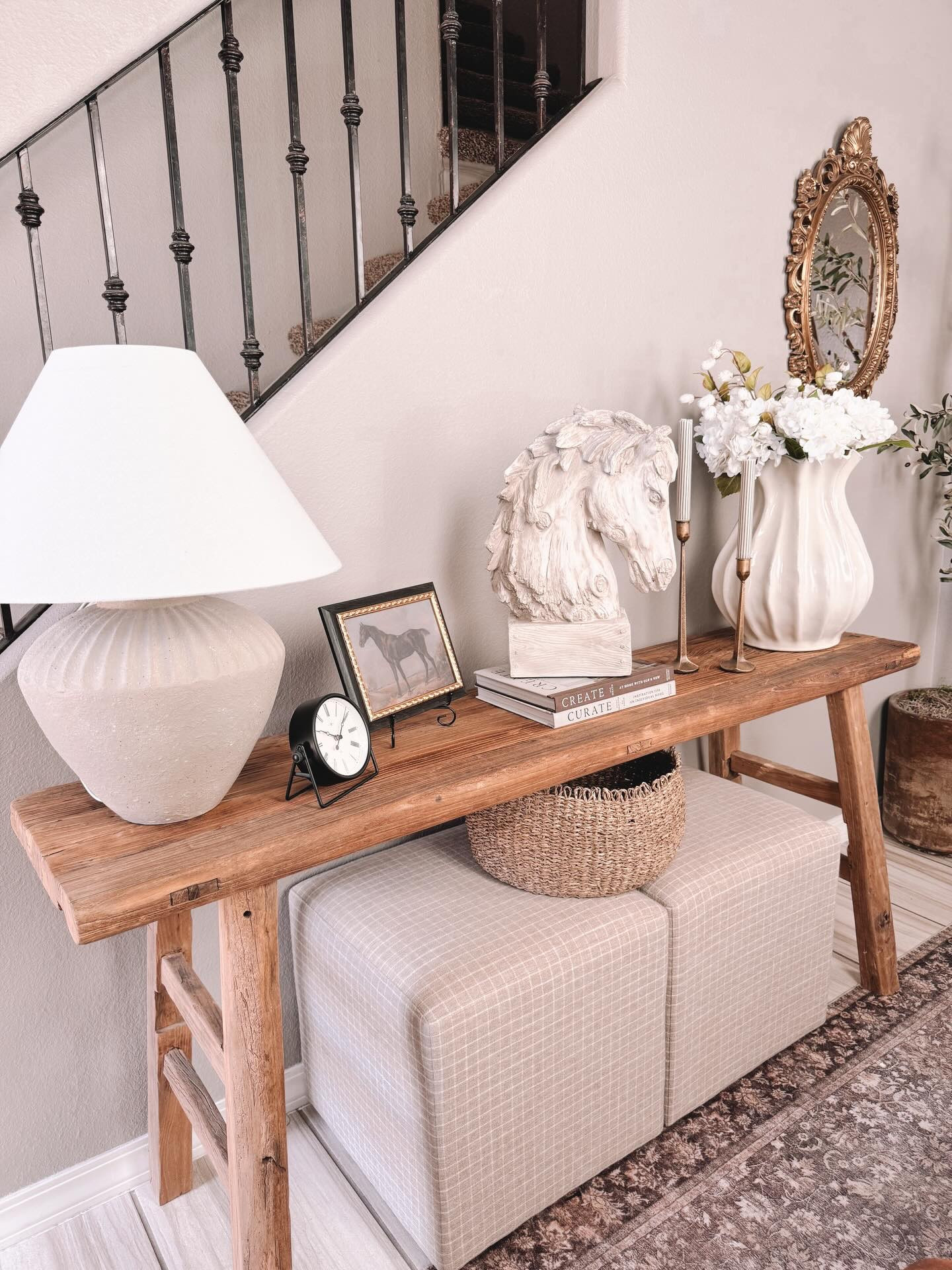 So how many horses are too many?! Haha, I don’t really care because Amelia loves them and so do I! She can’t wait to have a farm and a barn full of horses so until then, she says this will do. 

I think styling the entryway is my favorite and creating a cozy and pretty space to walk into is important when coming home. It’s a sigh of relief from this loud and busy world and also a sign of comfort, peace and joy that you get to relax, be yourself and enjoy the people who matter most . 

#entrywaydecor #neutraldecor #springdecor #consoletabledecor #entrywaytable