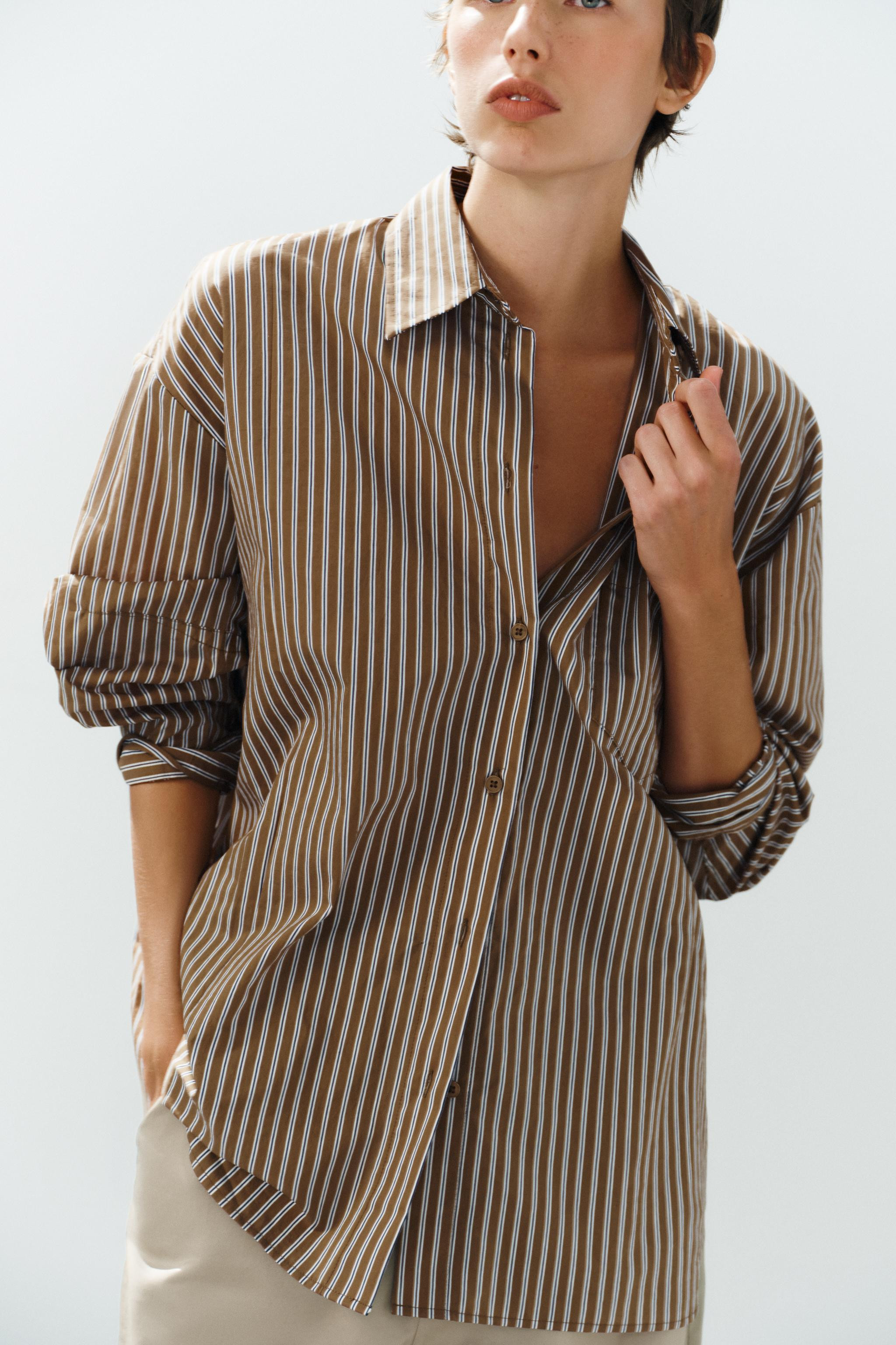 Model height: 179 cmCollared long sleeve shirt featuring a front patch pocket and a button-up fro... | Zara UK