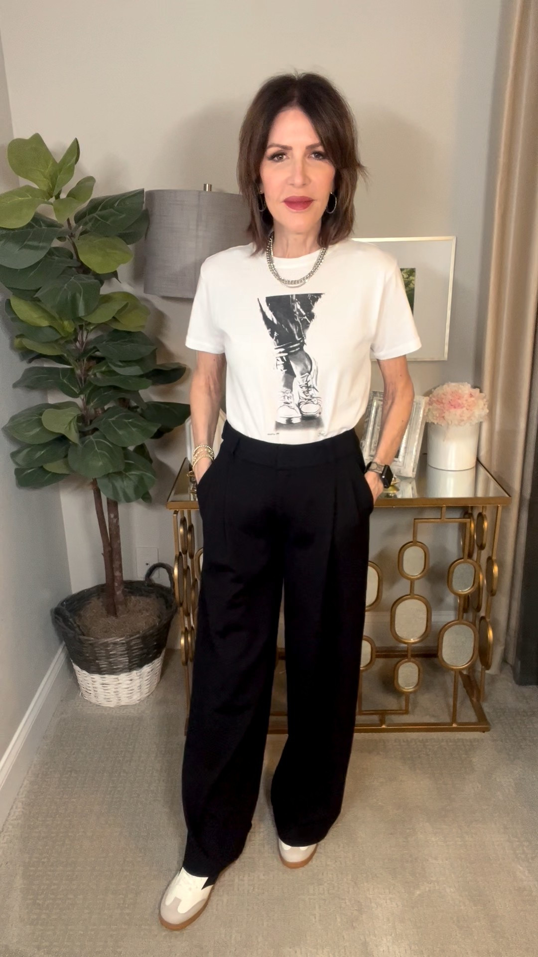 graphic tee, black wide leg pants, neutral sneakers, over 50 outfits 

#LTKootd #LTKOver40 #LTKSeasonal