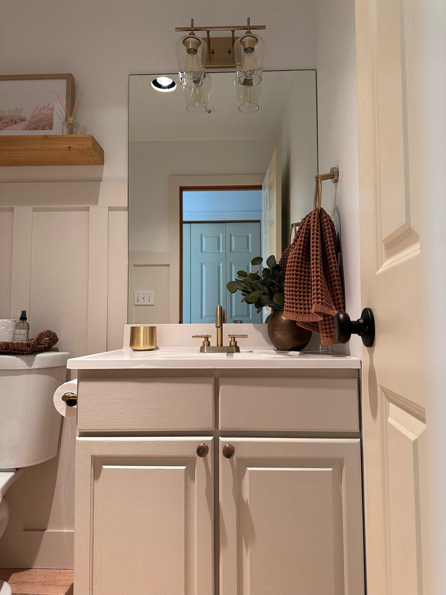 Neutral bathroom inso! I love the look of creamy whites, beige and brass together! Beige bathroom- gold handles- brass light - towel holder -bathroom ideas -bathroom decor 

#LTKhome