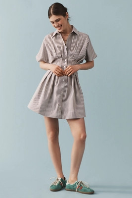 The @heynasreen Tobie Button-Front Pleated Mini Shirt Dress by Exquise | Anthropologie (US)
