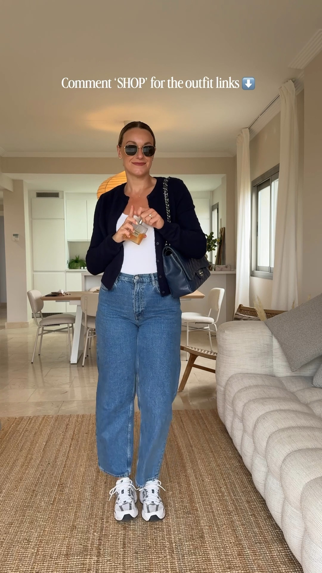 Mid-size friendly spring outfit of the day COS mid wash straight leg jeans, new balance 530, white Zara vest, navy H&M cardigan, Chanel navy large handbag, Raybans , CHANEL Gabriel perfume

#LTKmidsize #LTKuk #LTKspring