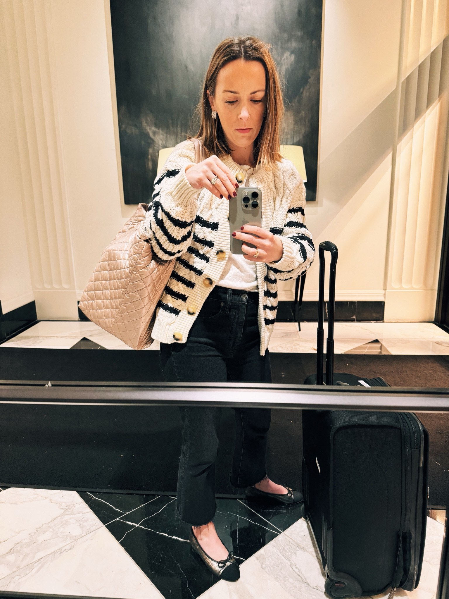 Ideal travel day outfit - layers, stretchy jeans, slip on shoes, and a zip top bag that fits everything. 

#LTKtravel #LTKstyletip #LTKitbag