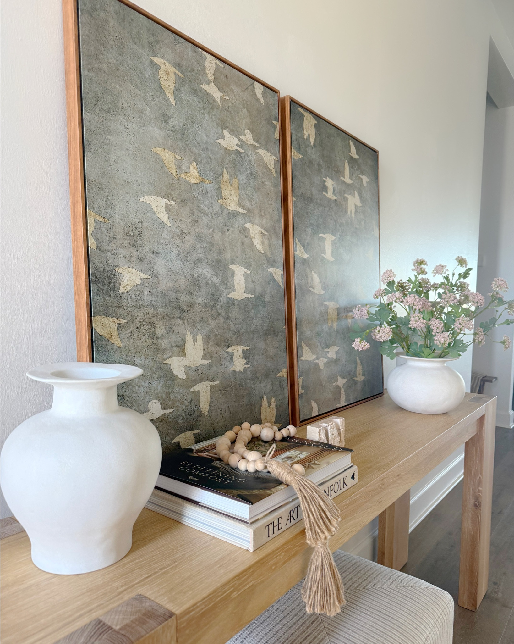 Entryway, entryway decor, console table, console table styling, neutral home decor, white vase, coffee table books, spring flowers, floral stems, travertine candle holder, canvas art, framed art, area rug, neutral rug 


#amazon #target 

#LTKSeasonal #LTKHome