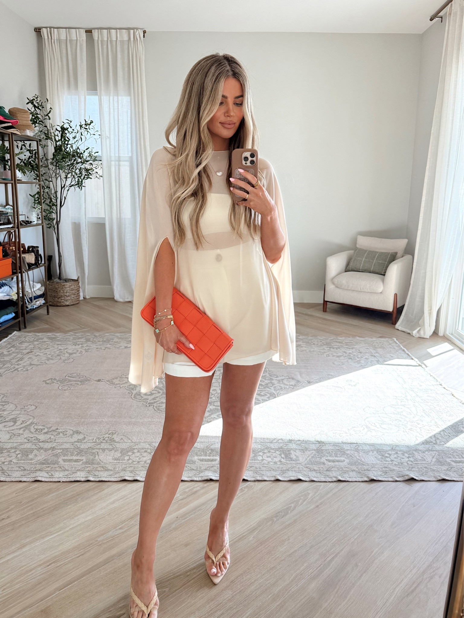 Wearing: 
Small cape 
Med tube top 
Med shorts