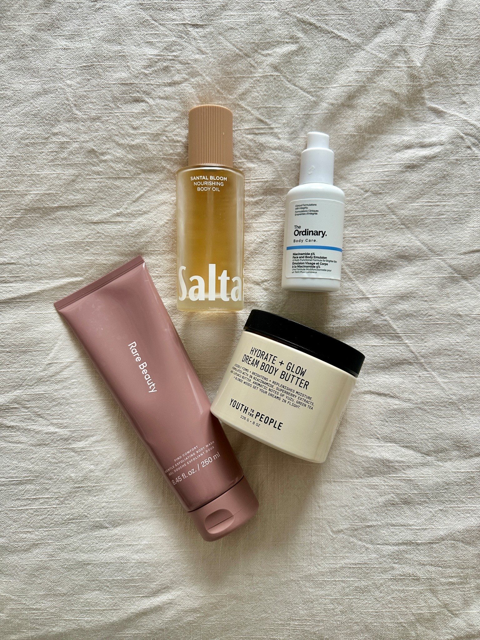New body care and after shower pick-ups that I have been LOVING for my skin. 🧖🏽‍♀️🧼

The body butter and body oil are insanely hydrating. I picked up the 5% Niacinamide body serum from the ordinary to help with tone of my arms and legs. 

The Rare Beauty exfoliate body wash is a nice lather and honestly i got it for the smell, so good! 

#LTKBeauty