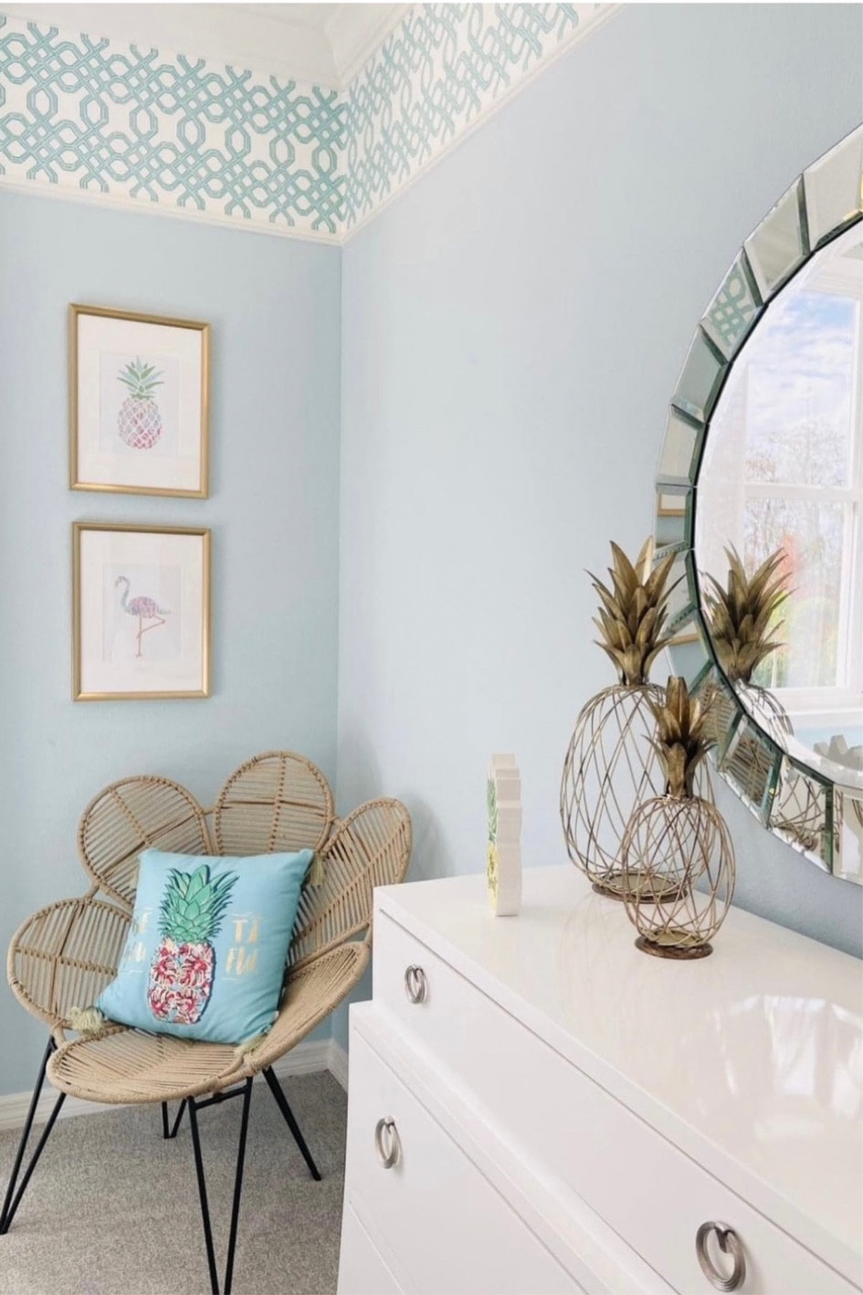 Coastal Bedroom Decor with white dresser, round mirror, wicker flower chair with tropical decor.  #CoastalDecor

#LTKhome #LTKsalealert #LTKstyletip