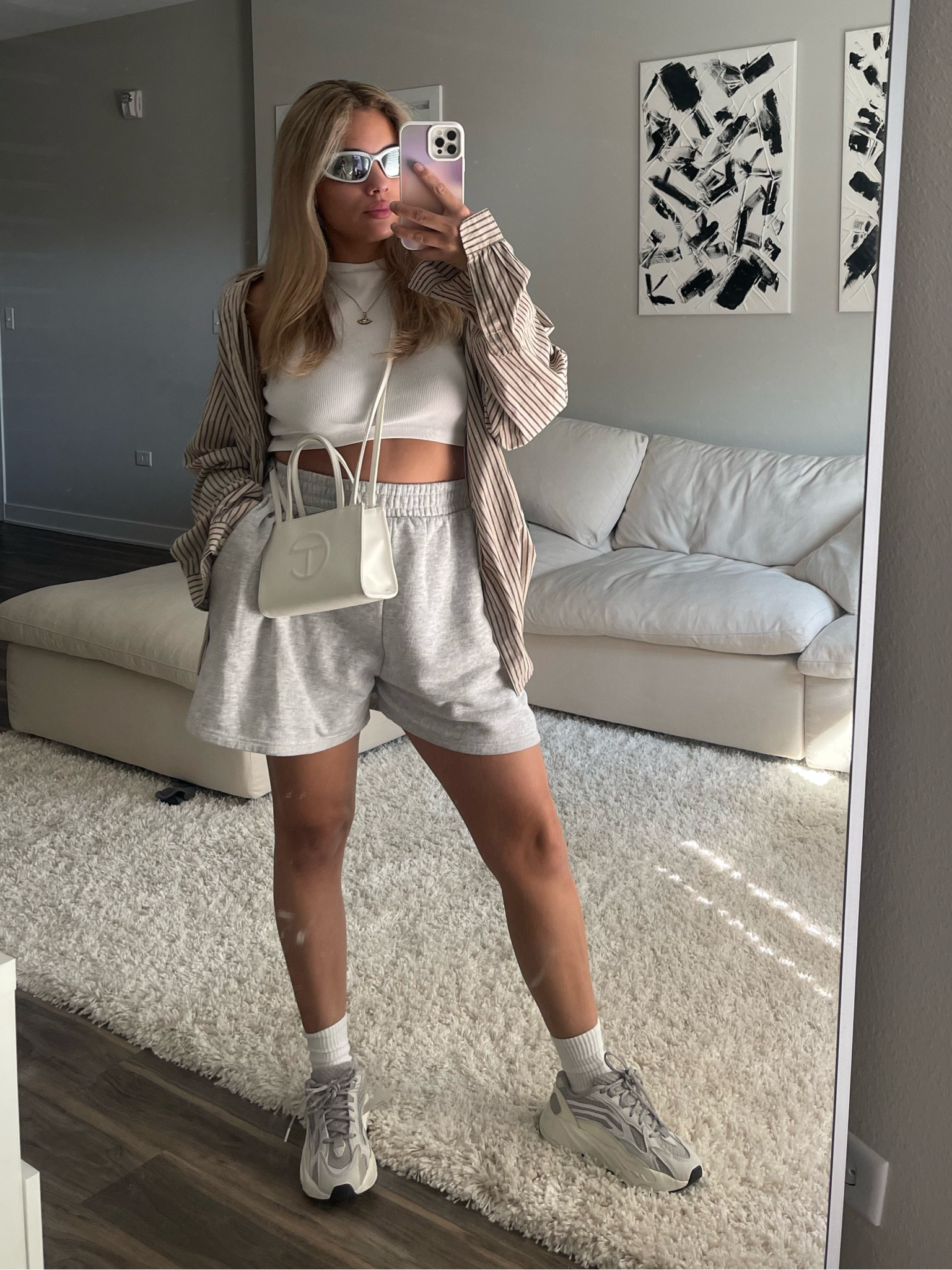 Chill outfit. Streetwear style. Minimal streetwear. Yeezy 700. Telfar bag. Wrap around sunglasses. Outfit for everyday. Simple outfit. 

#LTKfit
