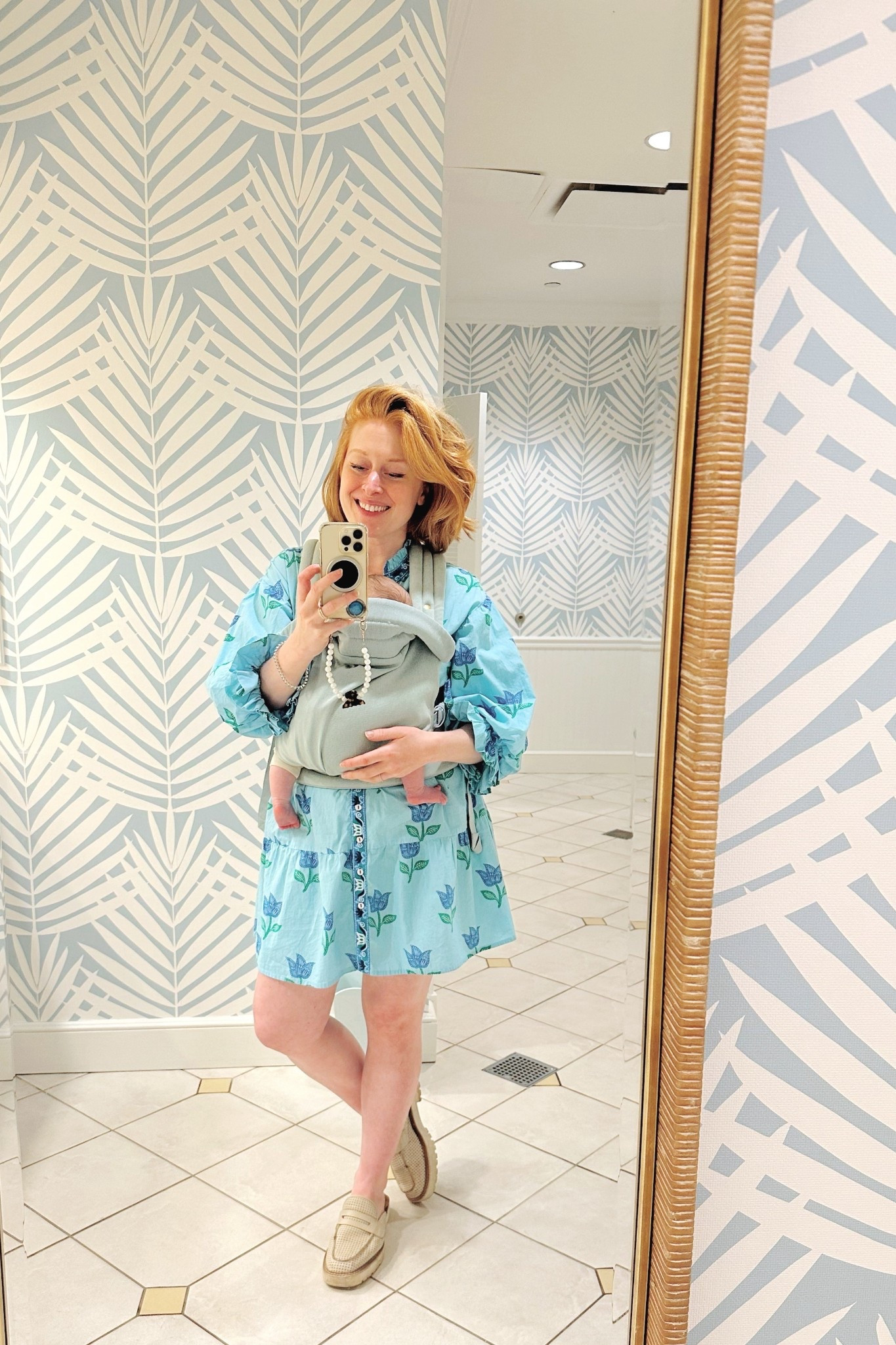 Living for this dress & baby carrier combo that happens to match the bathroom💙
