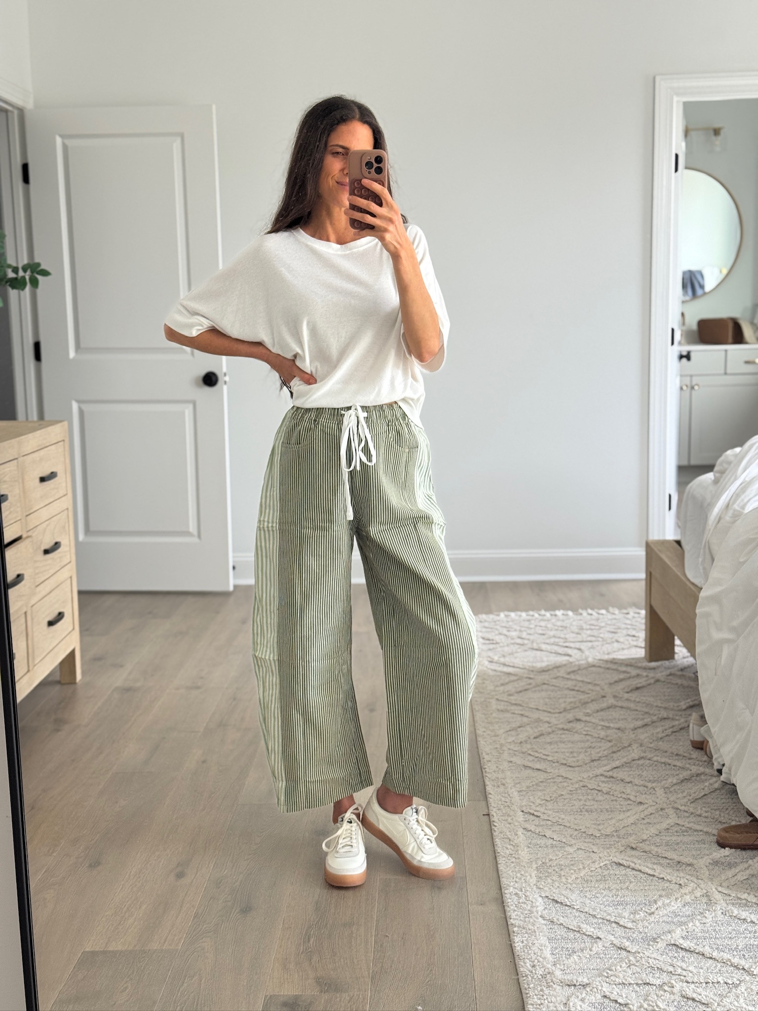 An easy everyday outfit I keep reaching for. Lightweight striped wide leg pants + a relaxed white tee just works. Comfortable, effortless, and still looks put together.

Perfect for errands, school drop off, or slow weekends.

#LTKSeasonal #LTKmomlife #LTKootd