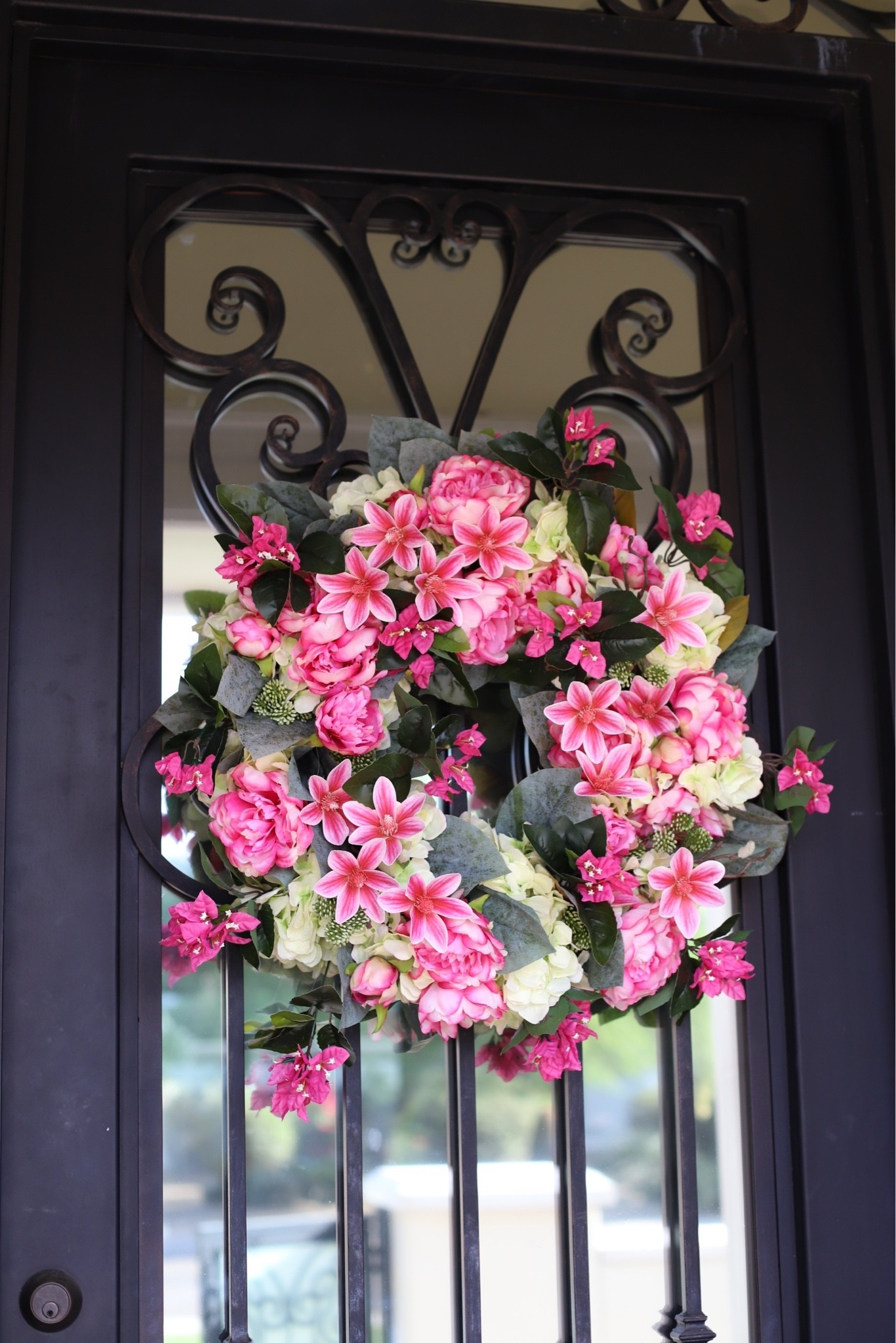 #Ad Summer curb appeal officially activated 🌸 I found the prettiest 26” front door wreath on @wayfair and it’s currently 40% off! The faux florals look SO realistic, and I added a few bougainvilleas to tie in the bougainvilleas I already have in my entry pots for the dreamiest summer entry moment 💗

Comment “summer decor” and I’ll send you all the shopping links! #wishyouwerehere #outdoor #Wayfair #WayfairPartner

#LTKHome #LTKSeasonal
