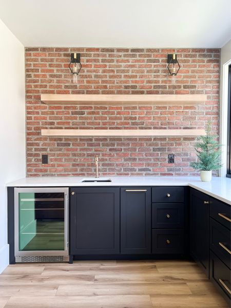 The wet bar in our basement. I love the brick detail! 

#LTKStyleTip #LTKHome