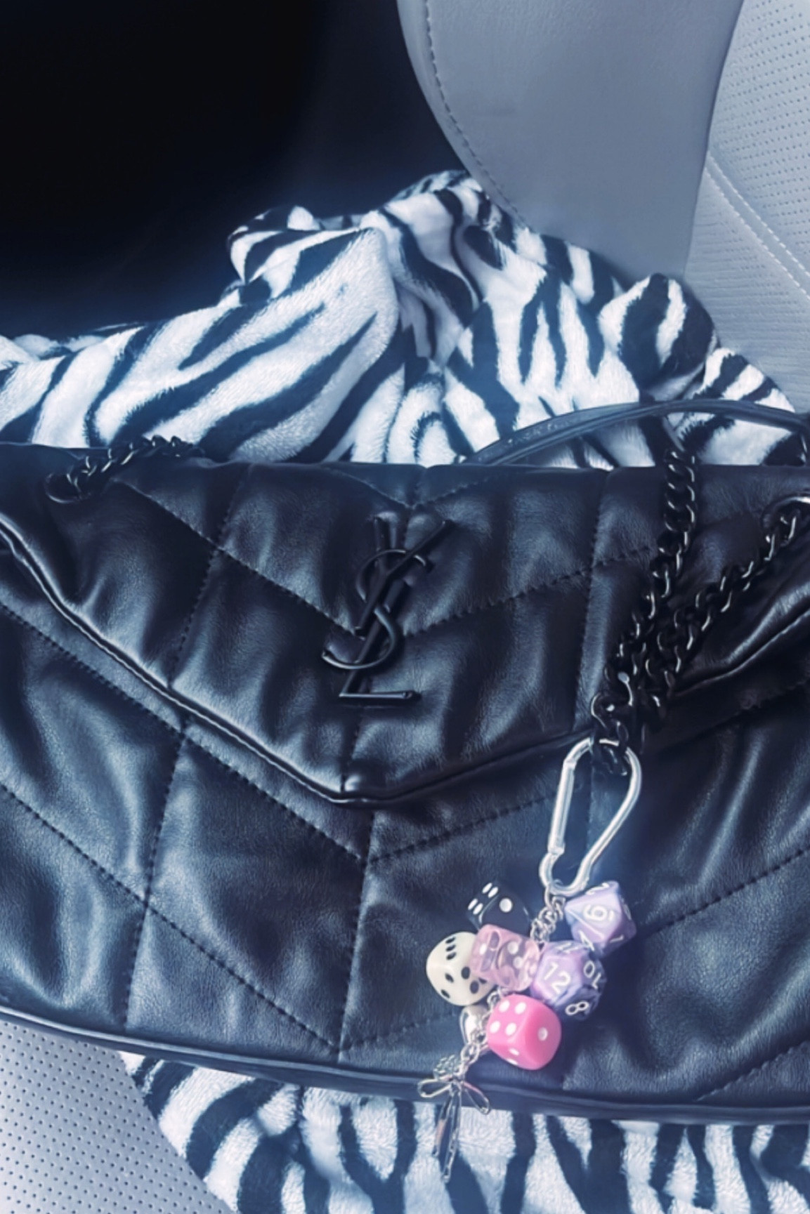 Obsessed with this bag charm and my fav bag!!!!! If i could only keep one bag it would likely be this one - the matte hardware makes it go with ANY metal color and it is just the perf size for everyday use!

#LTKfindsunder50 #LTKitbag #LTKfindsunder100