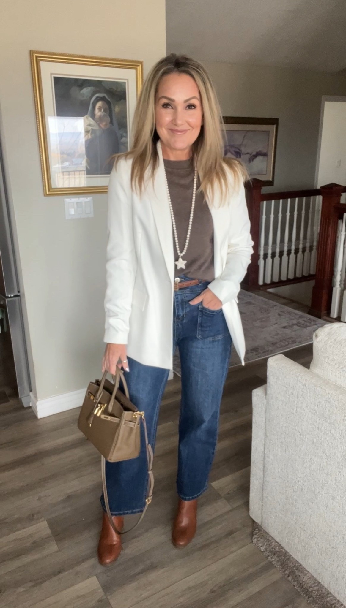 Casual jeans, brown sweater and white blazer. 

#FallFashion #FallOutfitIdeas #WomenOver50

#LTKOver40 #LTKTravel #LTKHoliday
