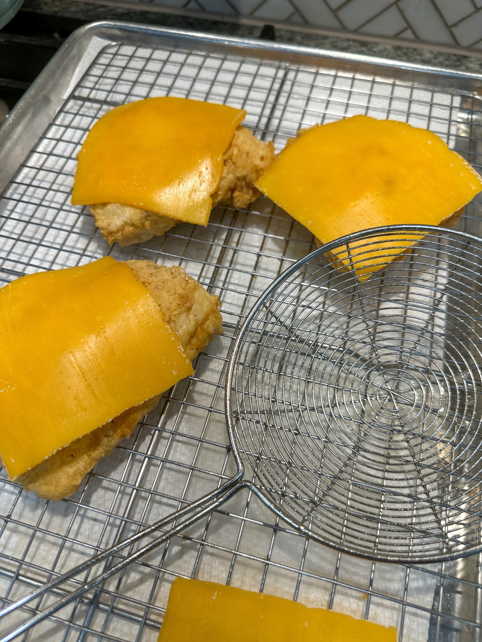 Fish sandwich on deck. #fishsandwiches #coolingrack #strainer #homecook #cooking 

#LTKfoodie