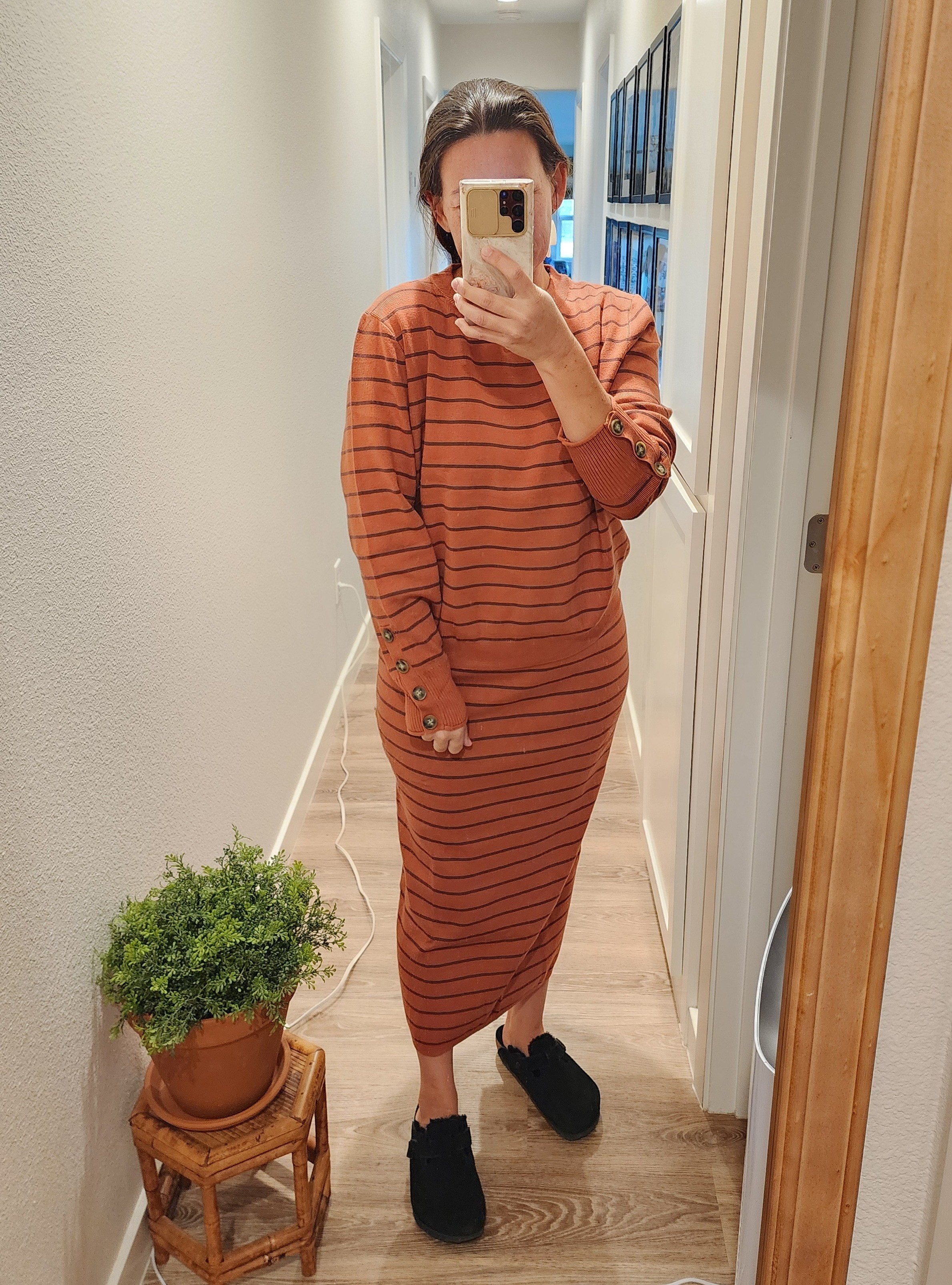Sweater set, but make it a skirt version! 😍  has a slit in the back. Very nice & thick fabric! I'm wearing an XXL.  I could actually go up a size, too for an oversized looser fit. The skirt is fitted. Comes in lots of color ways & sizes!/ #amazon fashion finds modest dress sweatshirt winter fall stripe stripes modest wear evening casual cozy comfy plush long midi under $50 

#LTKSeasonal #LTKSaleAlert #LTKFindsUnder50