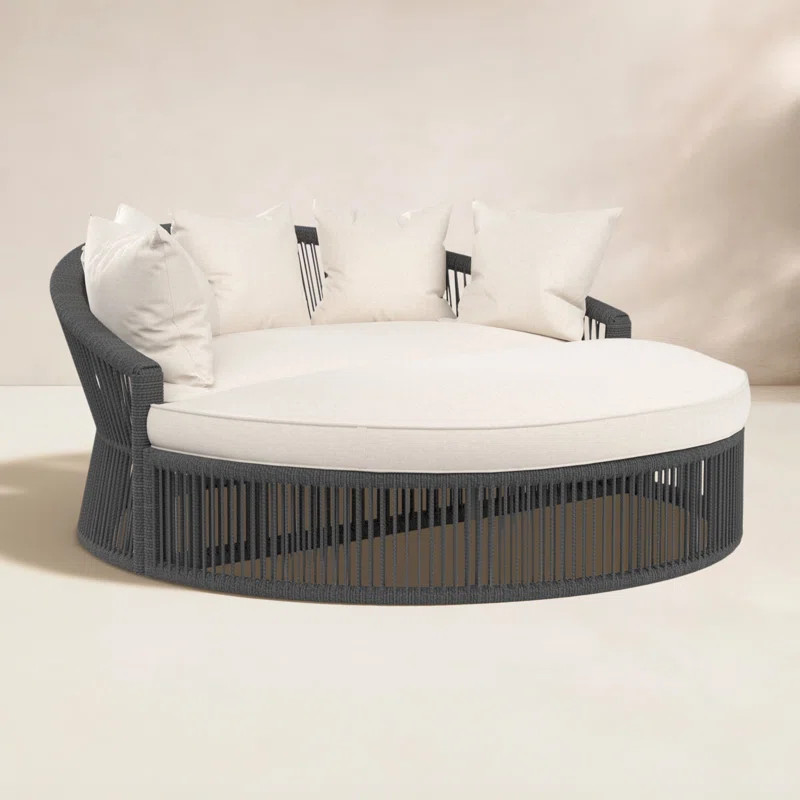 Renfri 67'' Wide Circle Patio Daybed with Sunbrella® Cushions | Wayfair North America
