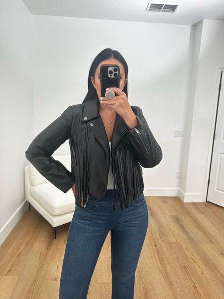 Sofia Jeans Women's Faux Leather Asymmetrical Zip Cropped Fringe Jacket wearing size small.  Sofia Jeans Women's Melissa Flare Pull On High Rise Jean wearing size 6. Nuuds SEAMLESS SCOOP TANK BODYSUIT wearing size medium. Gucci Leather mid-heel sandal. 