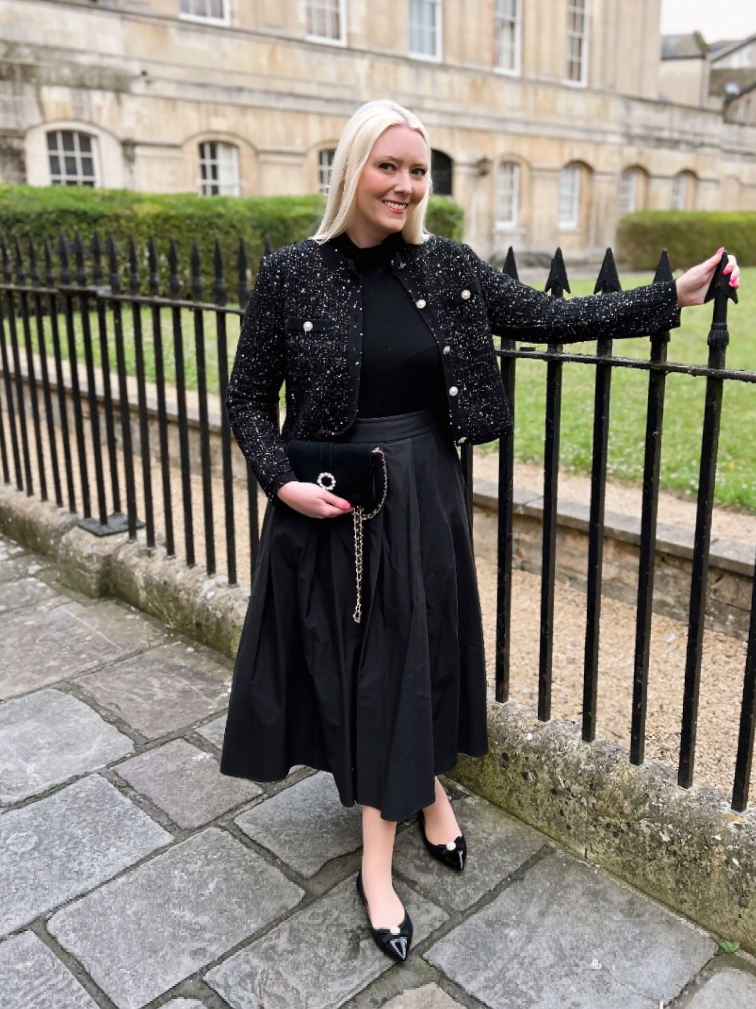 Back to black for a night at the theatre. I bought this sequin black knitted jacket from Mango last season and it’s cosy and chic! I partnered with the Mischa roll neck by Hobbs London, a full black midi skirt by Arket, pointed flats by Pretty Ballerinas & the Strictly black suede chain crossbody by Russell and Bromley - all pieces I’ve worn again and again but never fail to create an elegant look with vintage vibes. Finally, just a simple pair of Pearl Drop earrings by Lido Pearls.

#blackoutfit #classicfashion #elegantlook #eveningoutfit

#LTKuk #LTKeurope #LTKstyletip