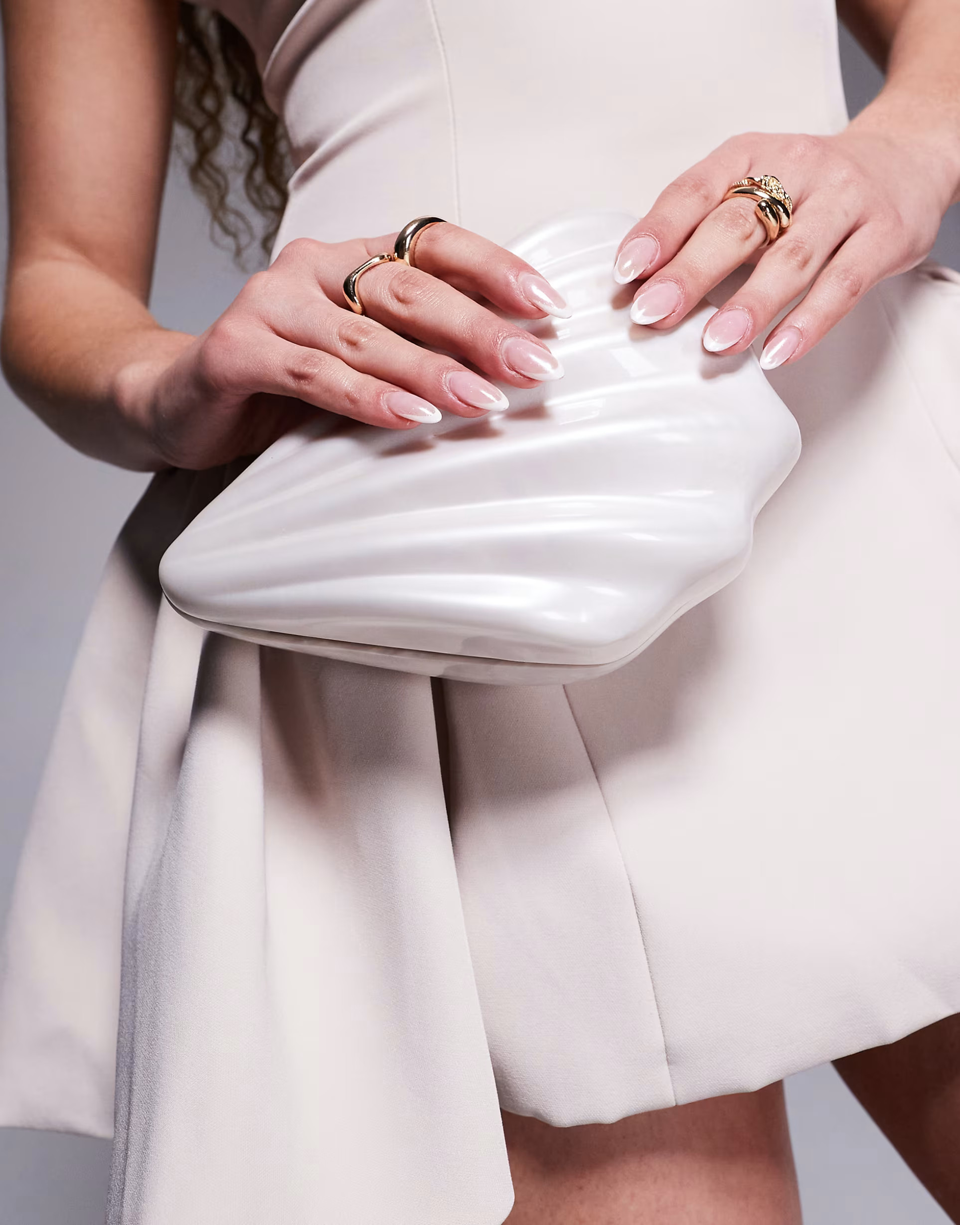 River Island shell clutch bag in cream | ASOS (Global)