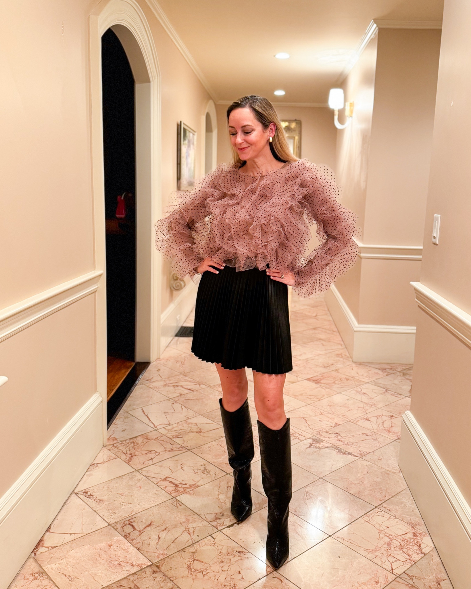 I cannot remember a top I loved this much.  It’s So. Stinking. Cute. And perfect for allllll the holiday events. I paired it with a faux leather skirt and boots for Friendsgiving but also can’t wait to wear it with black pants or distressed denim. Linked it for you! 

#LTKparties #LTKHoliday #LTKfindsunder100