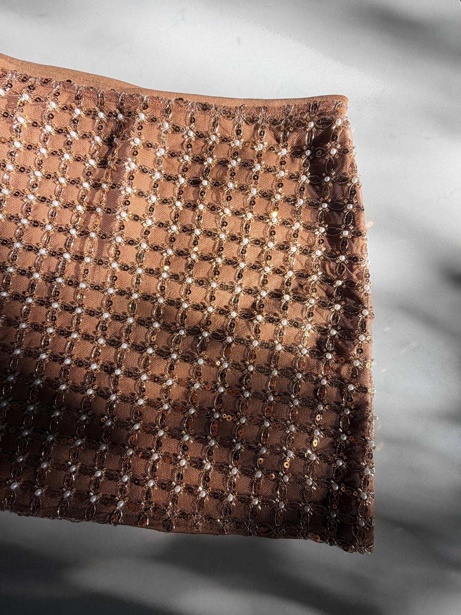 This mini skirt is giving beach vacation meets girls’ night out, & I’m obsessed. The gold beading catches the light so beautifully & instantly makes a simple tank or tee feel elevated. I got size small. @12th Tribe 

gold beaded skirt - mini skirt - vacation outfit - beach vacation style - resort wear - summer outfit - girls night outfit - neutral outfit - coastal style - date night outfit - summer trends - bronzed tones - elevated casual - vacation packing - weekend outfit - chic summer style - effortless style - statement skirt - warm weather fashion - summer wardrobe staples

#LTKootd #LTKdayinmylife #LTKU