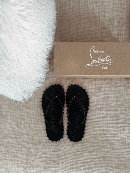 One of my fave holiday gifts from my husband. Obsessed with them. I’m typically an 8.5 and I got the 8 as there are no half sizes and they fit great 

 Super Loubi Flip Flop, Christian louboutin, target faux Mongolian fur pillow 

#LTKhome #LTKshoecrush