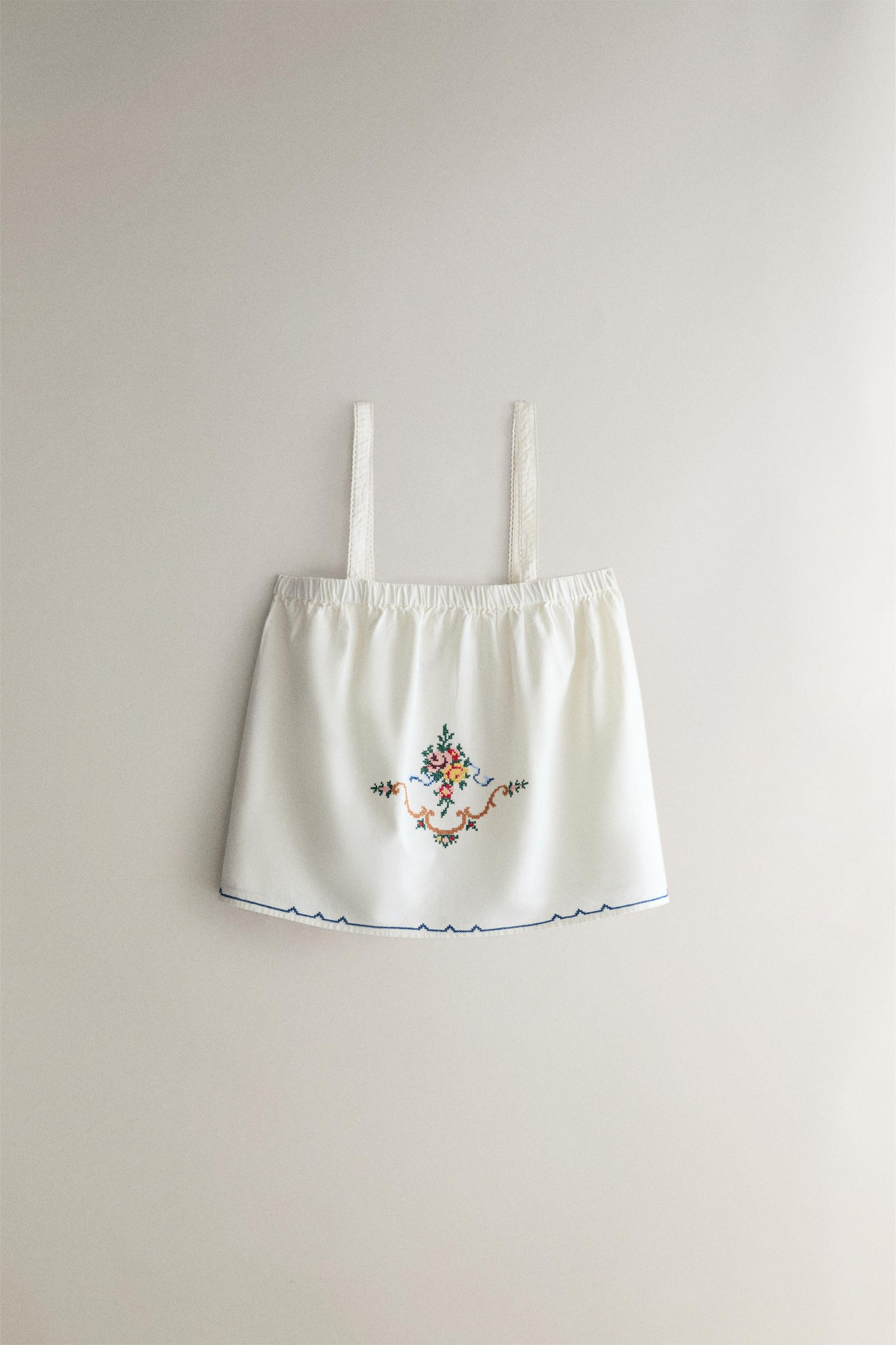 Top aus einer Baumwoll-Leinen-Mischung. Design mit geradem Ausschnitt, elastischer Raffung, feine... | Zara DE
