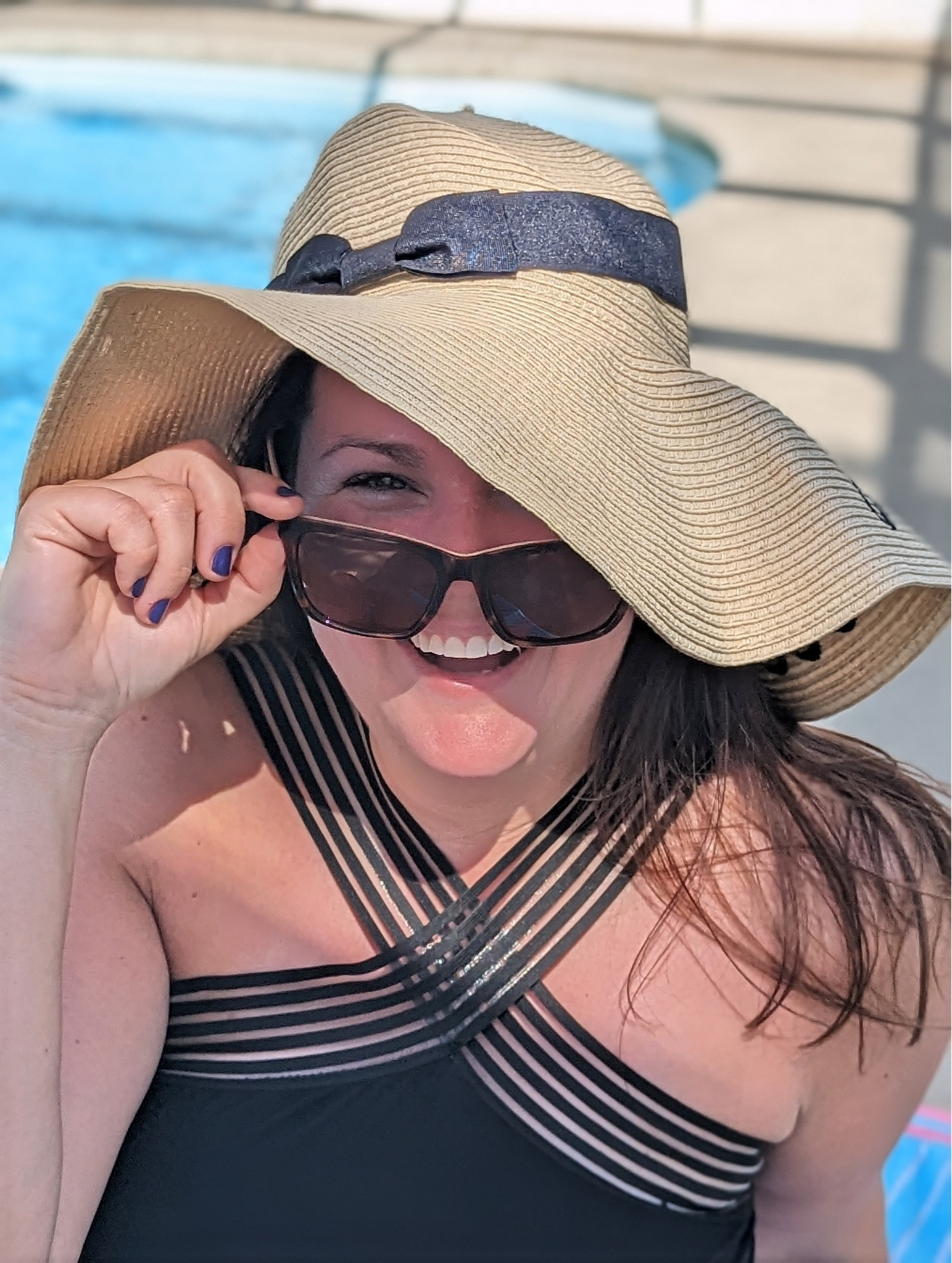 You can never go wrong with a black bathing suit. You feel comfortable, confident, and ready to soak up all the sun. I love to wear a sun hat along with a pair of sunglasses to complete this pool look. 

#LTKunder50 #LTKswim #LTKstyletip