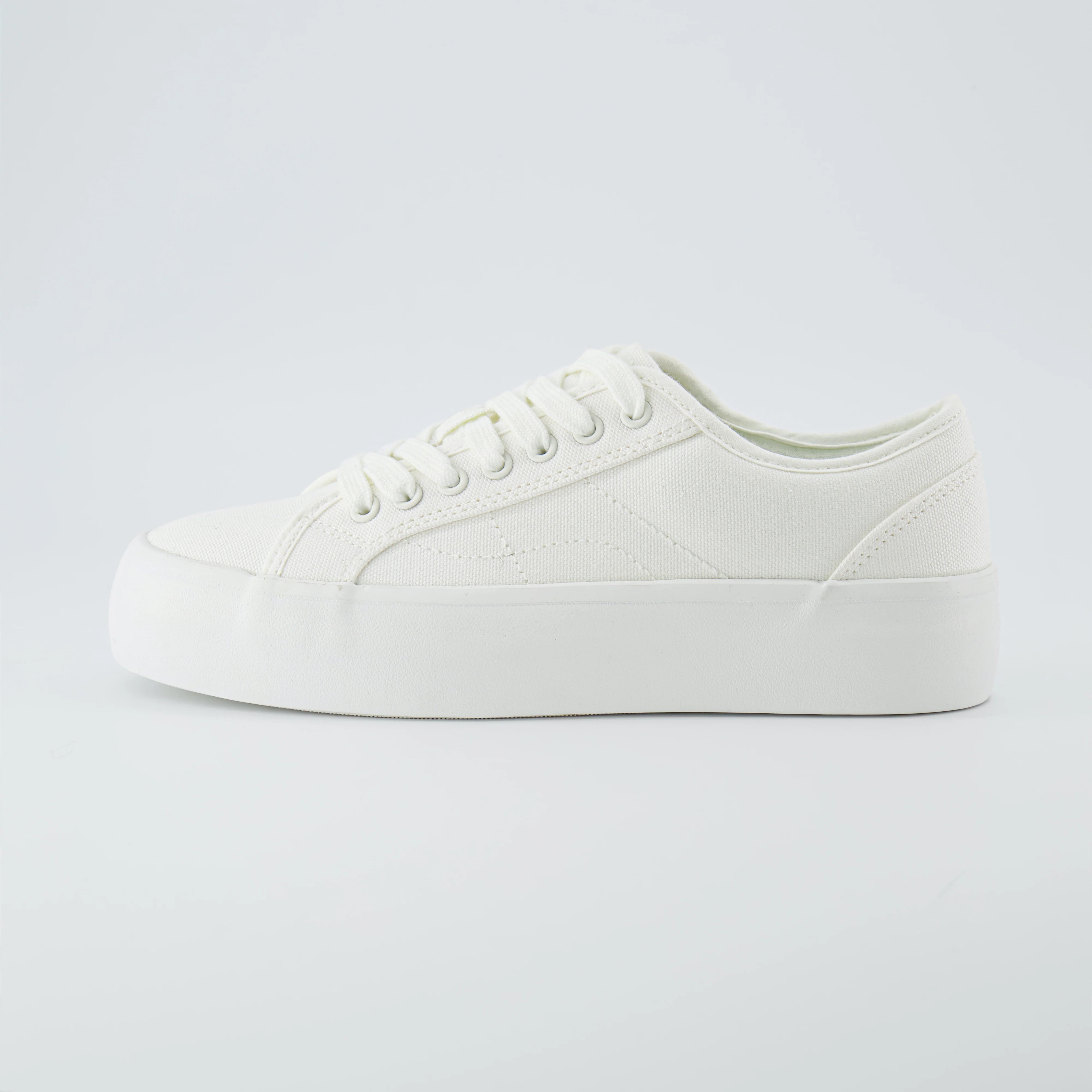 Tag Low Top Canvas Sneaker | Cushionaire