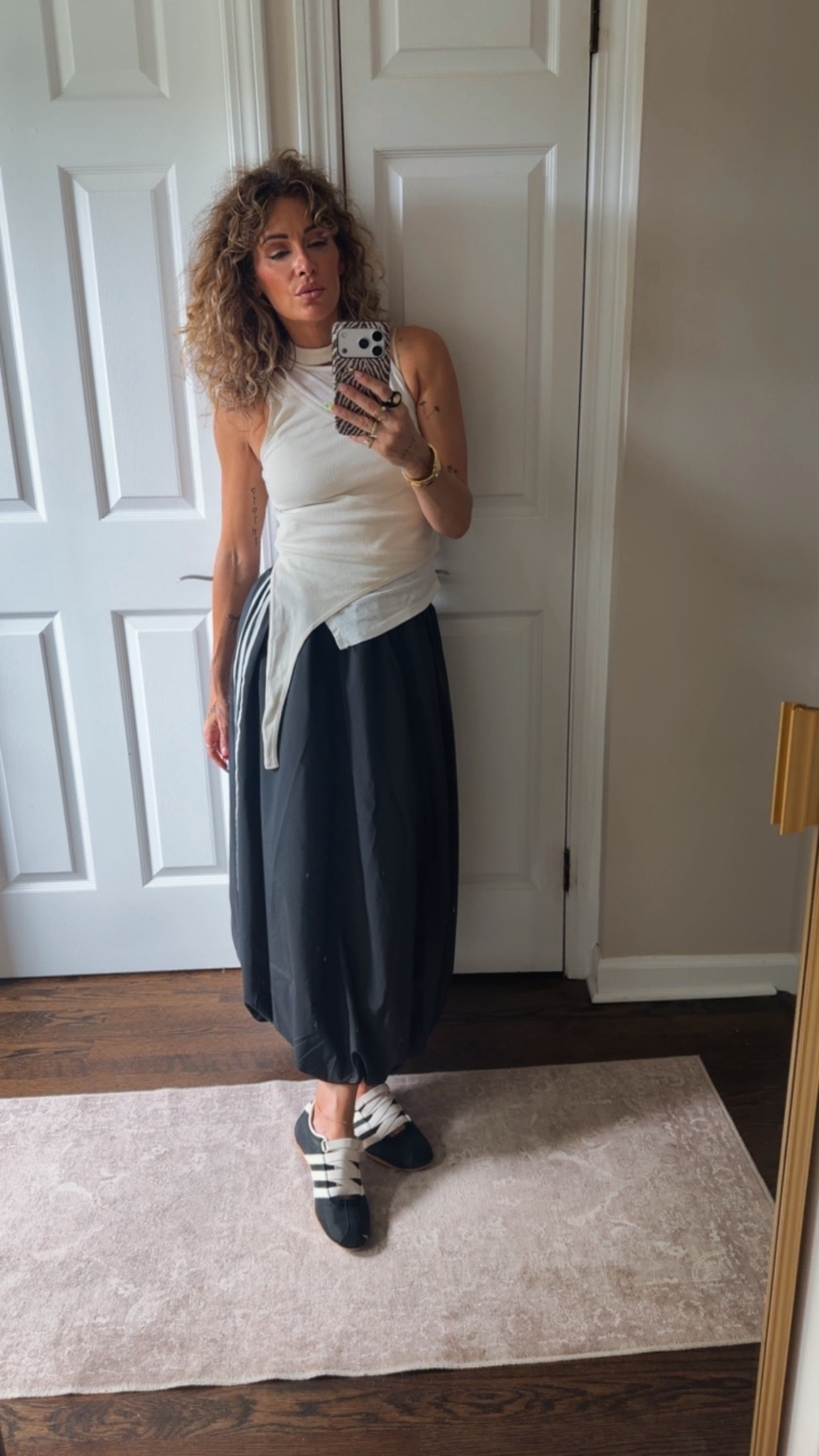 Size small in the ZARA tank and size 6 in the skirt