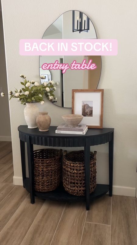 Our scalloped entry table is finally restocked!! It’s been sold out for MONTHS. I love the black wood grain look and scalloped detail. The half moon shape allows us to still open the coat closet door next to it. 
#entrytable #targetstyle #blackconsoletable #consoletable #entryfurniture 

#LTKStyleTip #LTKHome