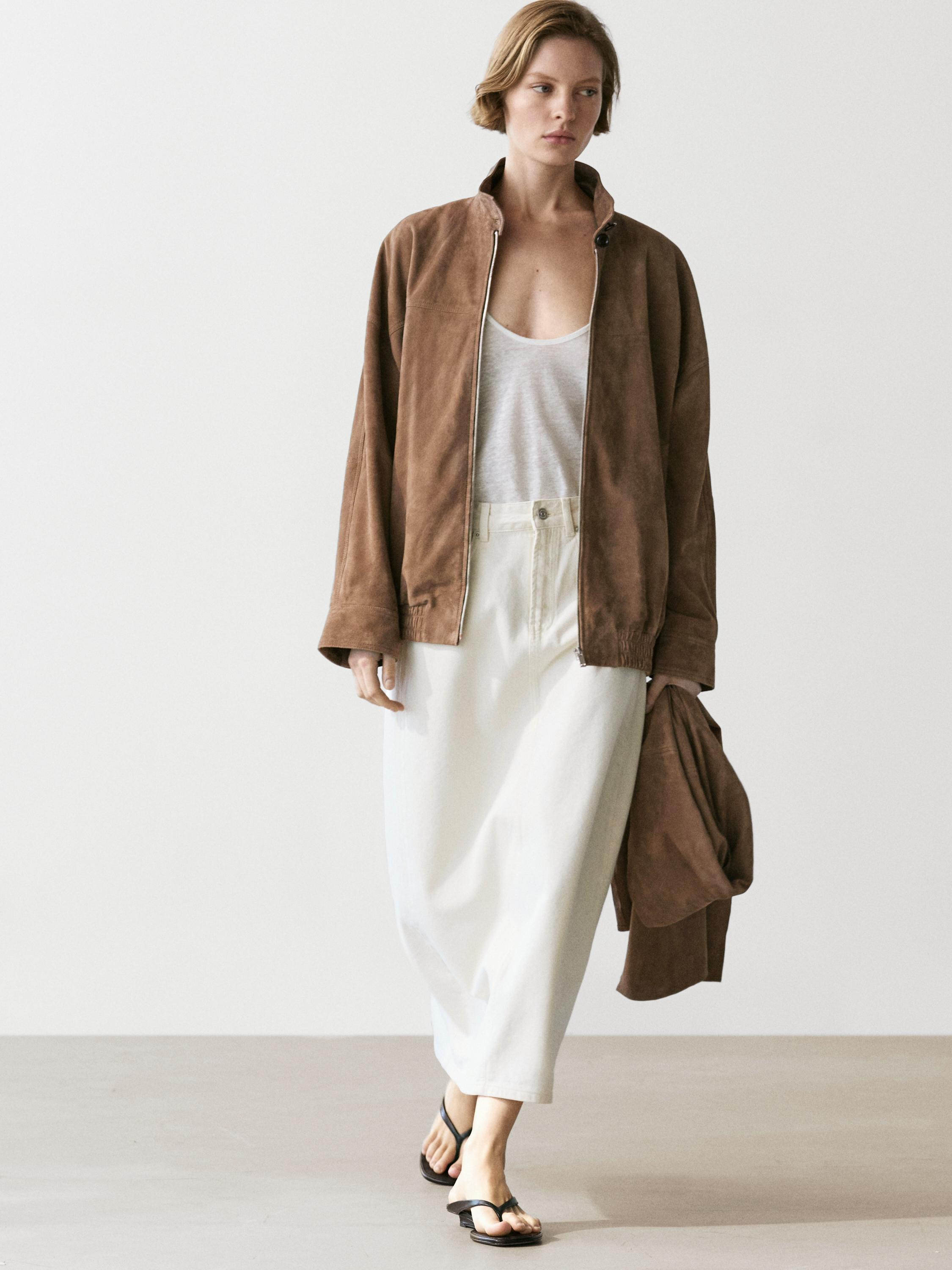Bomberjacke. Lange \u00c4rmel mit gekn\u00f6pften B\u00fcndchen. Mit Rei\u00dfverschluss. Eingear... | Massimo Dutti DE